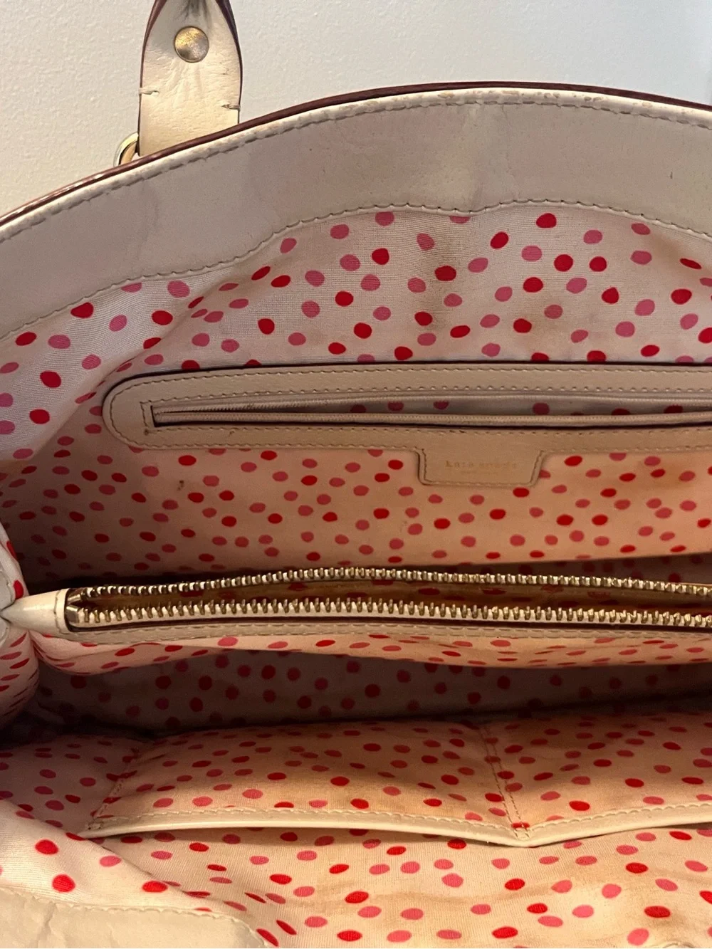kate spade cream leather tote with gold-tone logo
